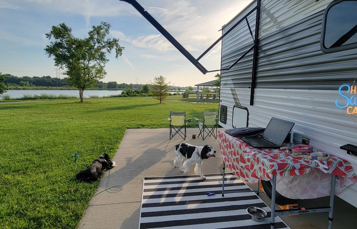 Outdoor rug, serving table & camping chairs.