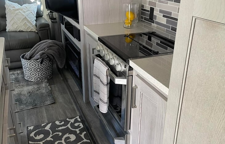 Plenty of room to prep and cook! Kitchen comes with non-stick for indoor use and even a couple of cast iron if you want your dinner fire side!