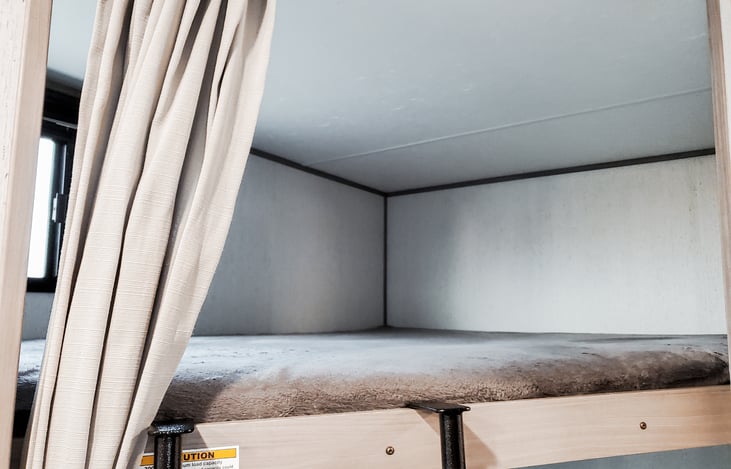 Top bunk with LED light and USB charging port