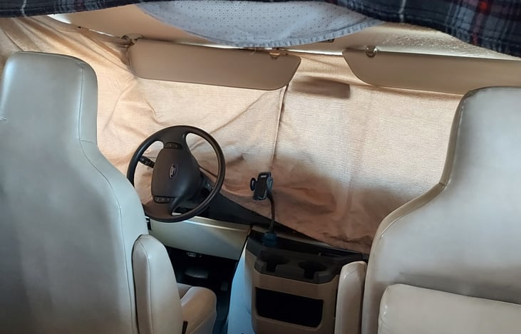 Front windshield curtain for privacy.