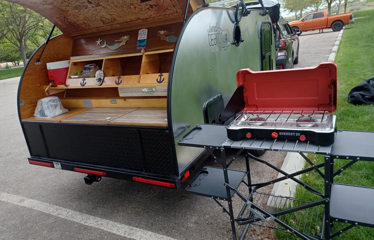 This Camp Chef Stove and foldable kitchen are Rockstar's in the industry. Makes cooking quick and easy.