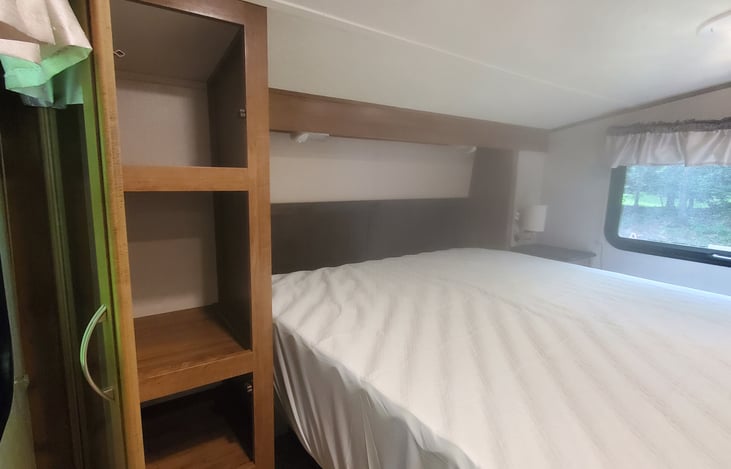 3 SHELF STORAGE. QUEEN BED HAS 3" MEMORY FOAM PAD