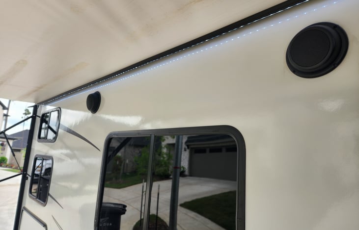 Outdoor Speakers and Retractable Awning.