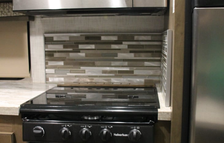 Gas burning stove and oven