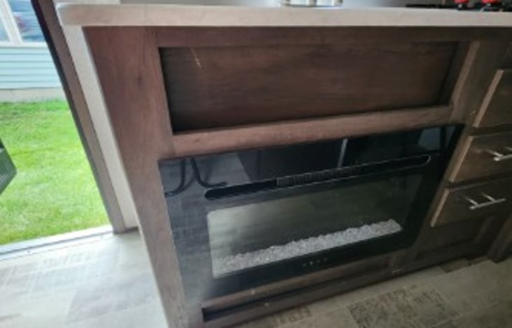 LED Electric Fireplace that does heat well in the colder months. Select many different colors/moods.