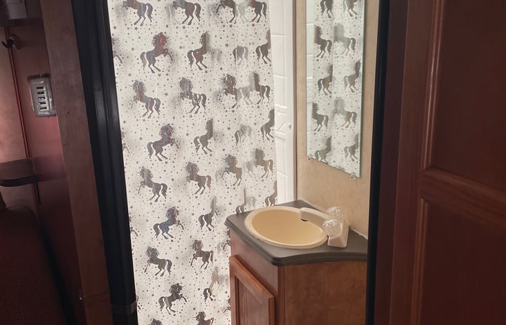 Bathroom with closing door.