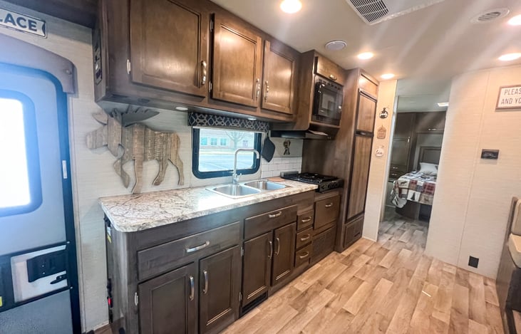 kitchen view from the cab area. lots of spacious cabinets