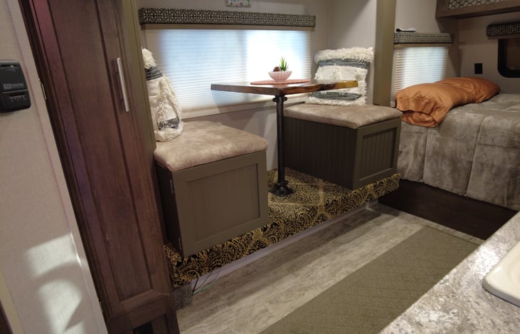 Dining for two with storage under each seat. Comes with some games for a rainy day too.