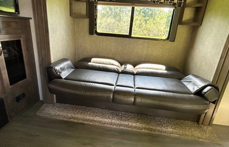 Jackknife sofa folds out into a full size bed.