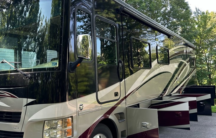 Side entrance door with large storage openings.