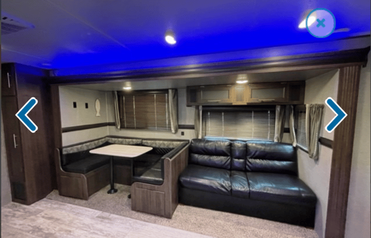 Dinette sits 5 comfortable and converts to another sleeping area. Couch also converts to another sleeping area. Ample lighting!