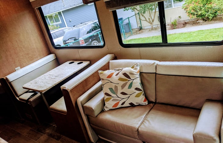 Sofa & dinette w/ additional seatbelts for a total of 6.