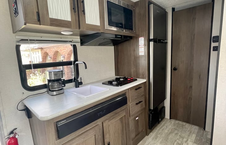 Full Size Refrigerator, microwave, 2 stove top burners, coffee pot