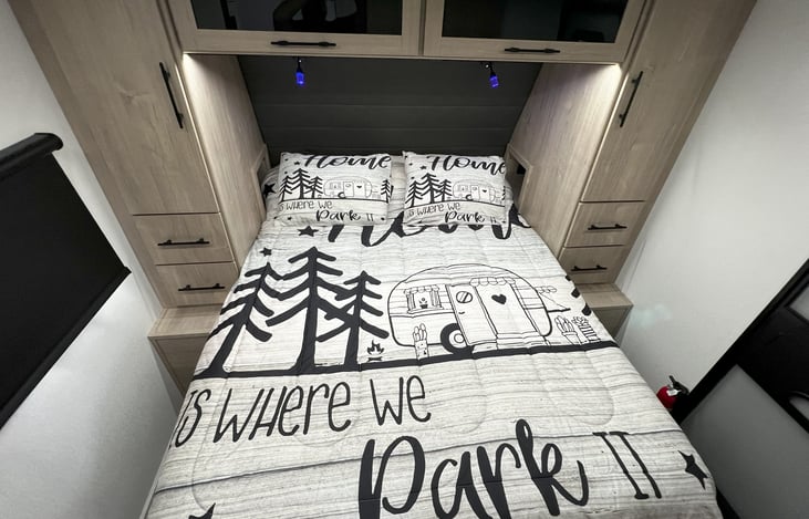 Master bedroom with sliding door for privacy.