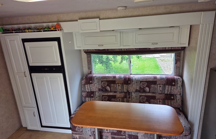 Dinette folds down into full sized bed
