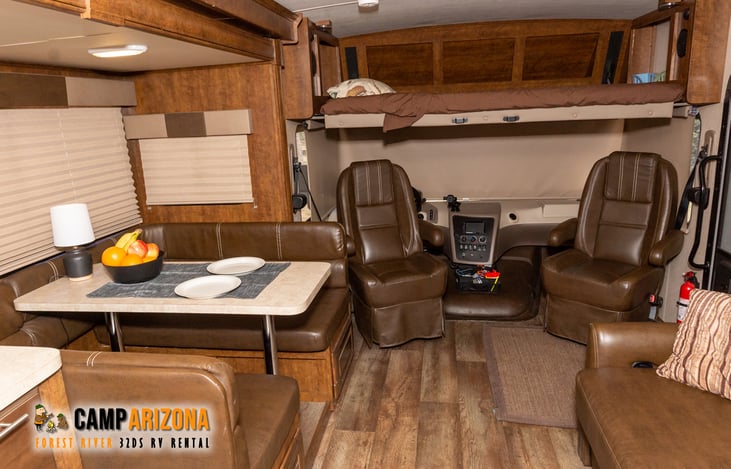 Captains Chairs swivel around for more seating when parked