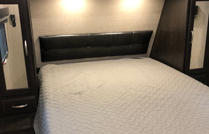 Queen size bed with memory foam topper