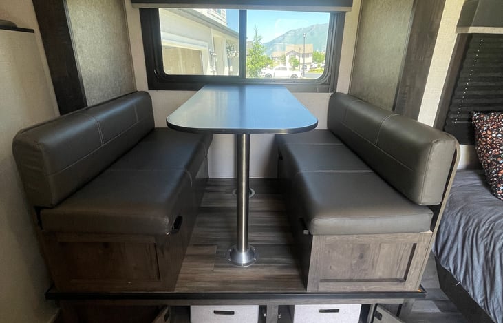 Dinette converts into a bed.