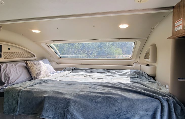Over cab bed with Star seeking window.