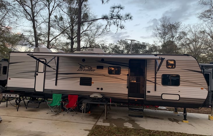 Outdoor View- includes 3 burner cooker, bbq, and 2 camping chairs
