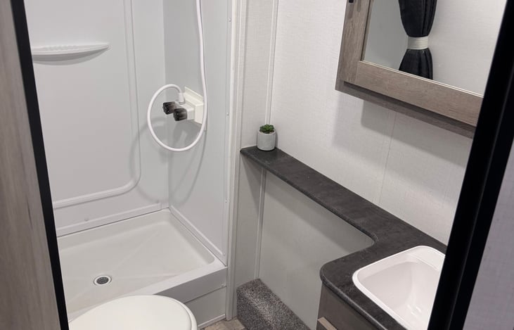 Full size comfy restroom. Water heater equipped for nice hot shower!