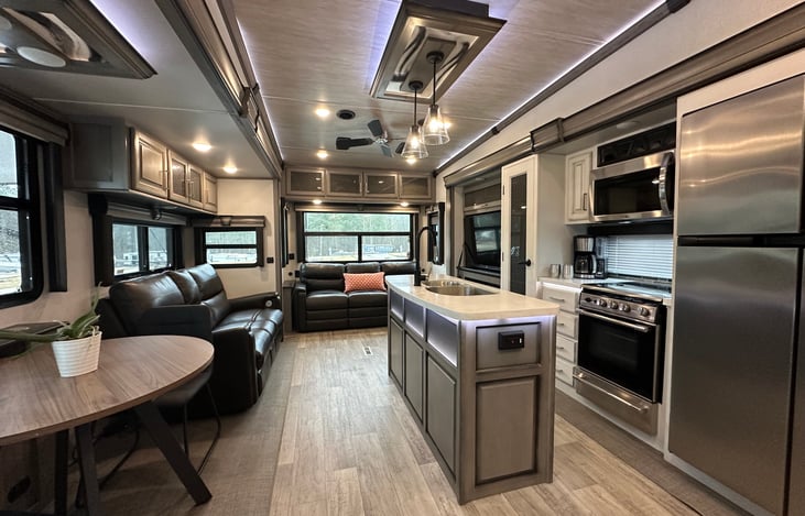 Overall main space - living, kitchen, dining, and island