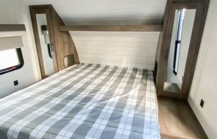 Queen bed in front bedroom.