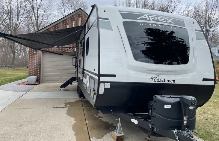 Front and side with awning out.