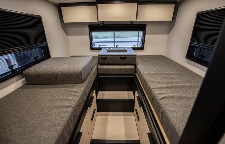 Shown in two twin configuration but you can use the added inserts to create a king size bed area.