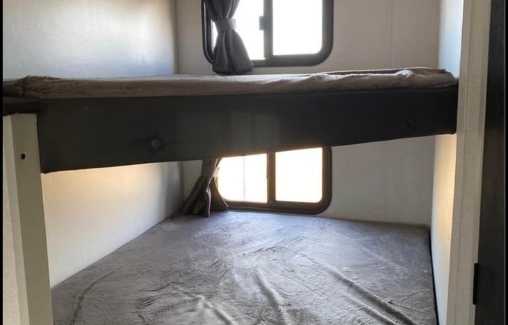 Double bunk beds; top bunk has a weight limit of 225lbs. Great for kids.