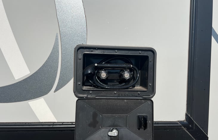 Outdoor shower with hot and cold water