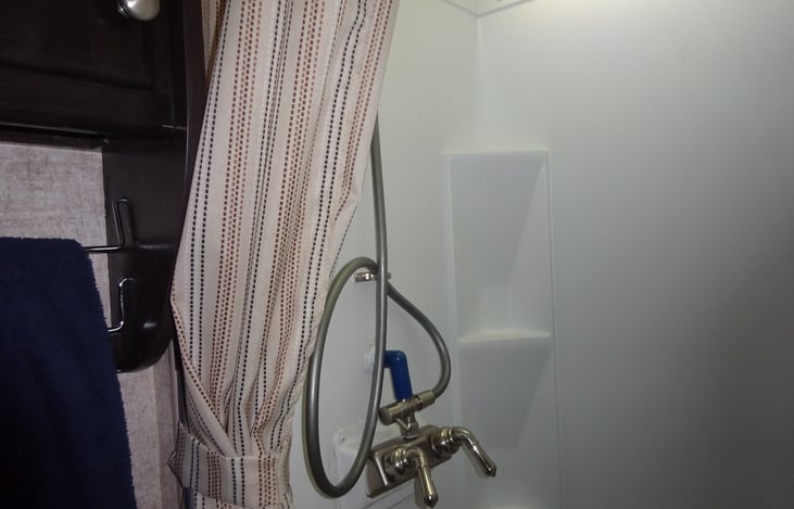 Sower stall with skylight