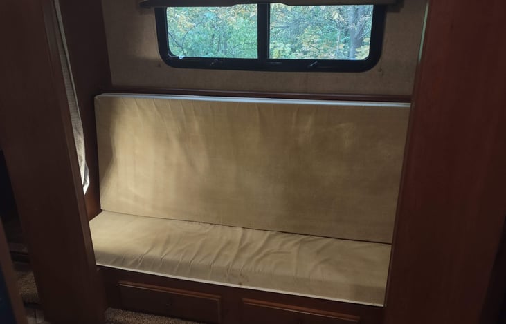 top bunk folds down to create sofa