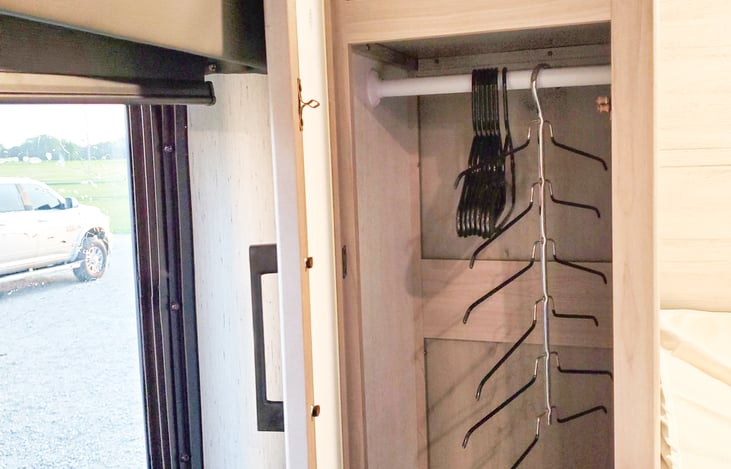 Dresser with hangers.