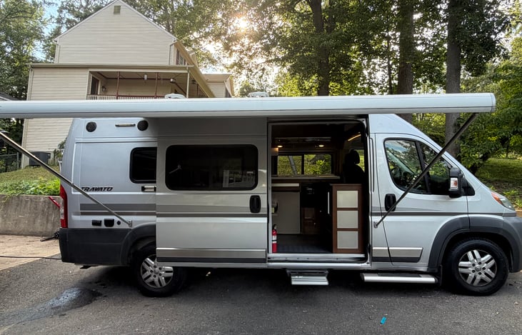 The Cozy Cruiser with awning out, and small step to make entry in and out a breeze.