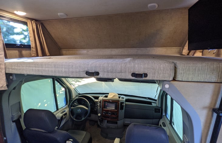 Huge overhead bed (queen size) with Roku TV for everyone to enjoy on a rainy night.