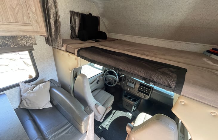 Overhead bunk or storage area.