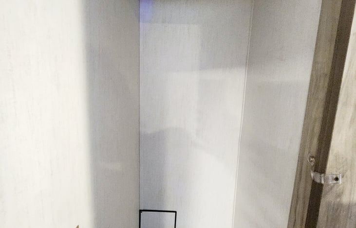 Closet in primary bedroom