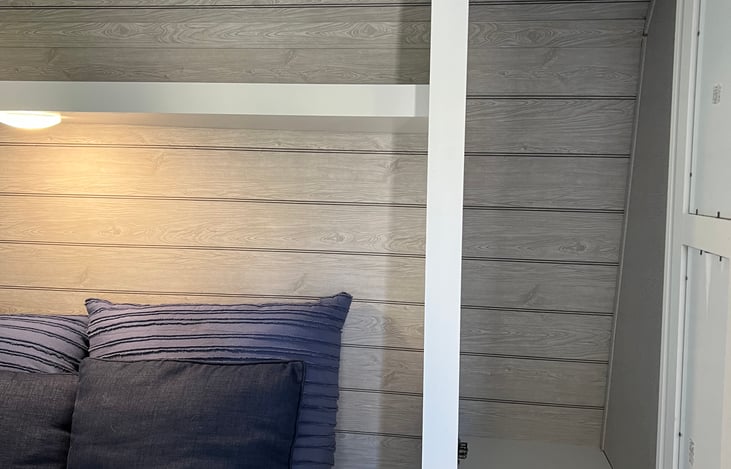 Master suite has a small coat closet on each side. Doors close to master.