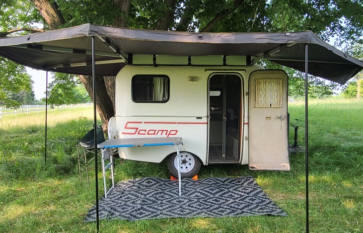 New awning!   270 degree wrap around with large area of shaded/dry coverage.