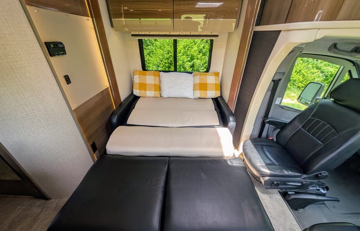 Comfortable leather couch converts to a Twin bed.