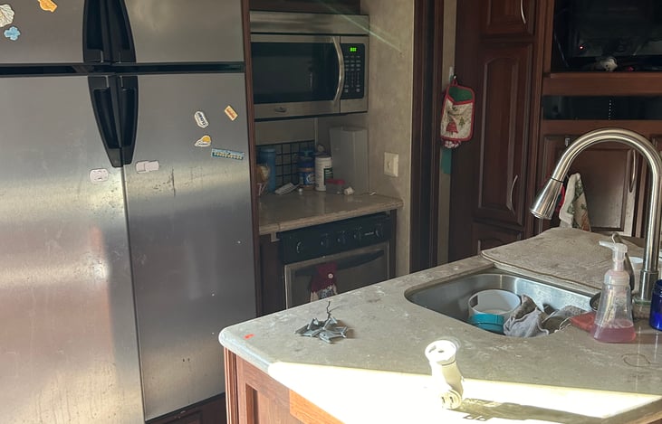 Convection, microwave, stove, and oven four-door fridge.