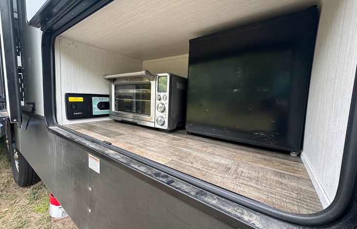 We call this the Outdoor Kitchen storage compartment.