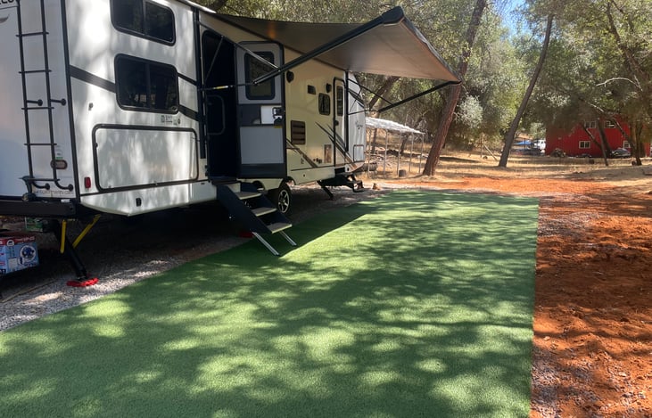Two entrances - one to the main living space, the other to the master bedroom. 
Outdoor kitchenette with a sink, fridge/freezer and counter space.