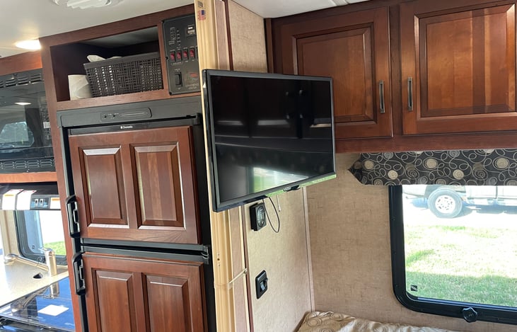 It has a TV for the main bed