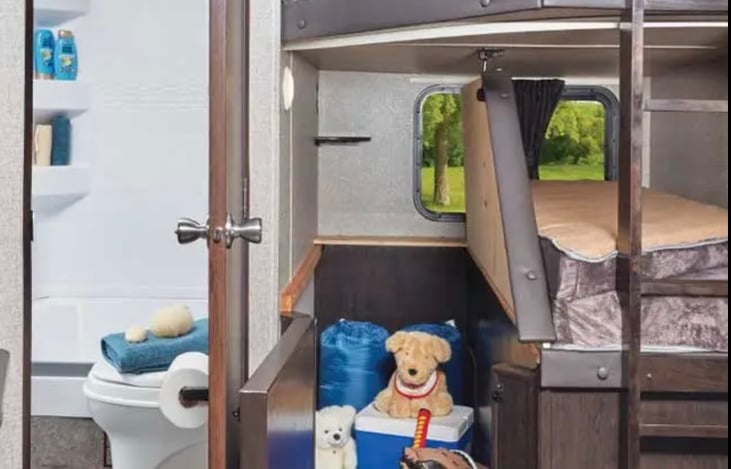 Bunk folds up for additional storage space