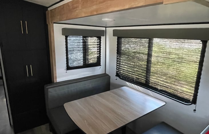 Seating for 4 dinette. Converts to an additional sleeping space.