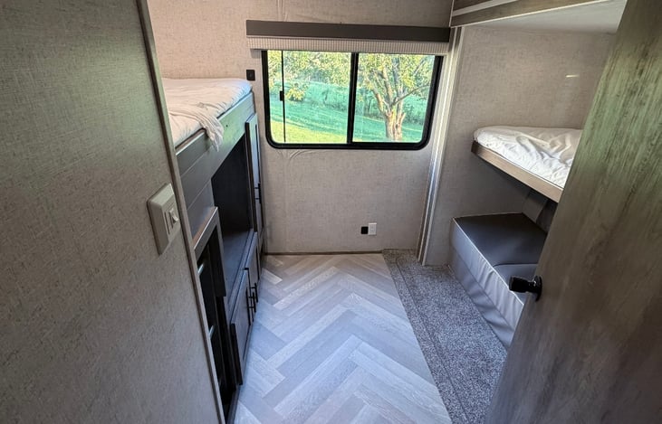 Private bunk house features 2 bunks and a sofa that converts to a bed