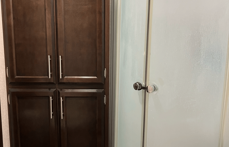 The bathroom has a standup shower, sink, toilet and 2 linen closets. Towels and washcloths included with rental.