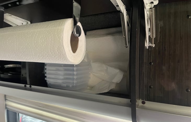Overhead Storage area: paper towels and tuppeware.